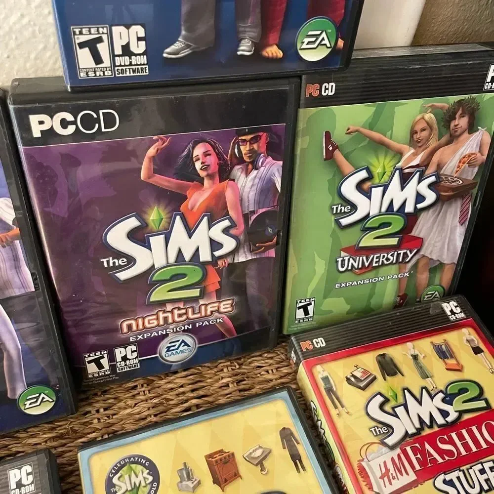 The SIMS PlayStation Vintage Side Video Game Lot PC DVD Pets Family Delux Sets